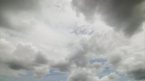 White Clouds Moving in Blue Sky Time Lapse