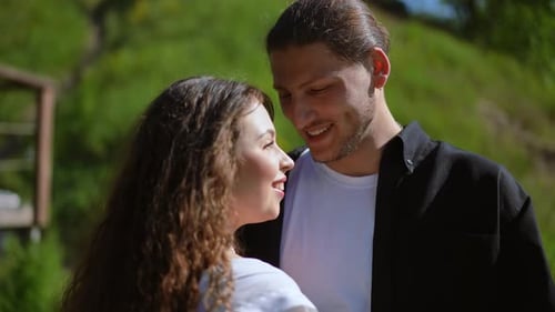 Loving Couple Smiling Together in Park