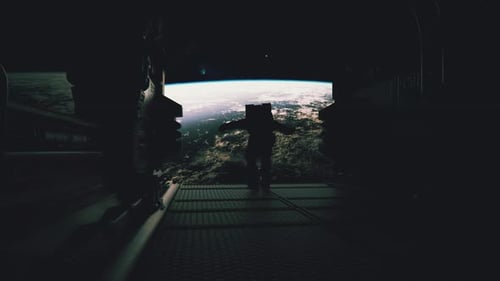 An Astronaut Runs and Almost Falls Out of a Spaceship Into Outer Space