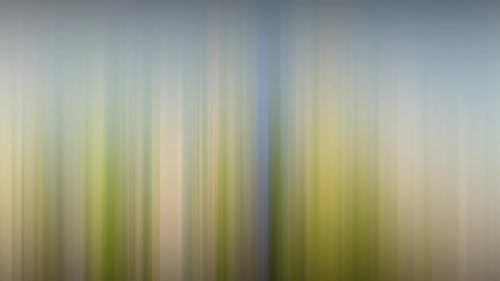 Fondo abstracto borroso en movimiento con patrón lineal vertical que cambia de formas y colores