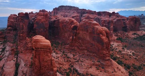 Flight around the stunning red rocks in the dry desert.