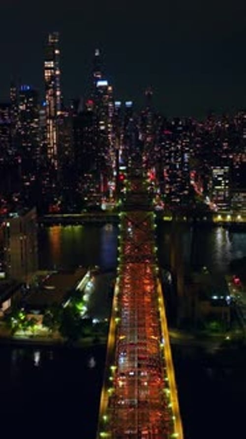 Wonderful Queensboro bridge crossing little island and East River.
