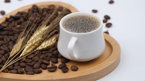 Brewed Coffee Cup with Coffee Beans and Grain