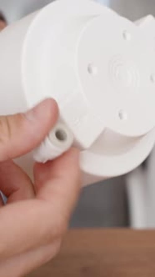 Attaching Water Filter Part to Filtration System