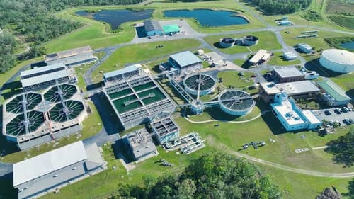 Aerial View of Modern Water Cleaning Facility at Urban Wastewater Treatment Plant Purification