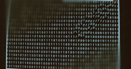 Screen Showing Stream of Binary Code