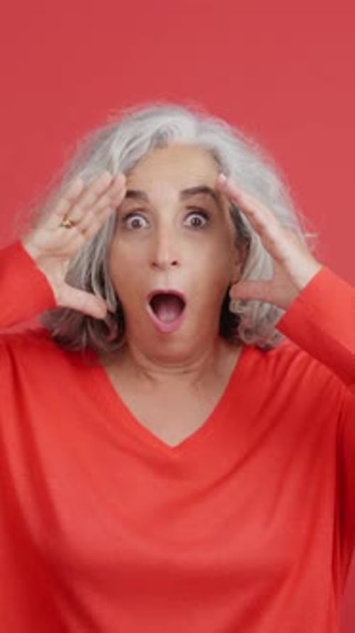 Senior Woman Reacting with Fright and Surprise