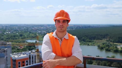 Construction Worker Smiling on Rooftop on Sunny Day