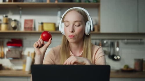 Attractive Cute Girl Enjoy Remote Work Sitting At Home Kitchen Wearing Wireless Headphones Close ...