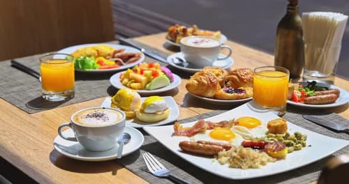 Delicious Breakfast Dishes Assortment on Table