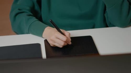 Hand Drawing With Pen Tablet on Desktop