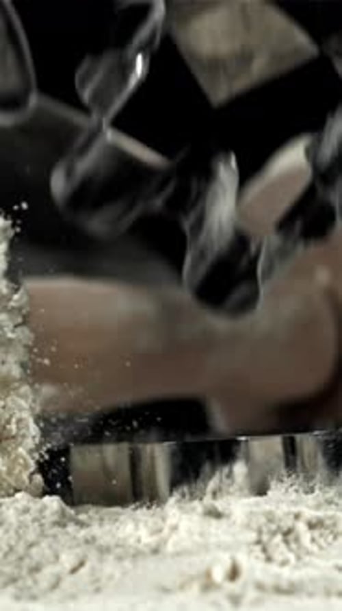Cookie Cutters Fall Into the Flour Filmed on a Highspeed Camera at 1000 Fps