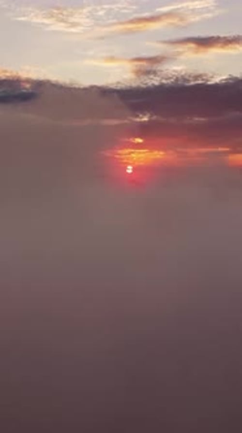 Aerial view of clouds at sunset