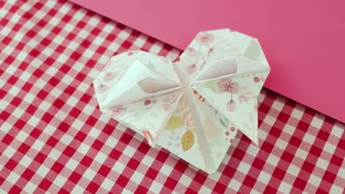 Floral Origami Heart on Red and White Background
