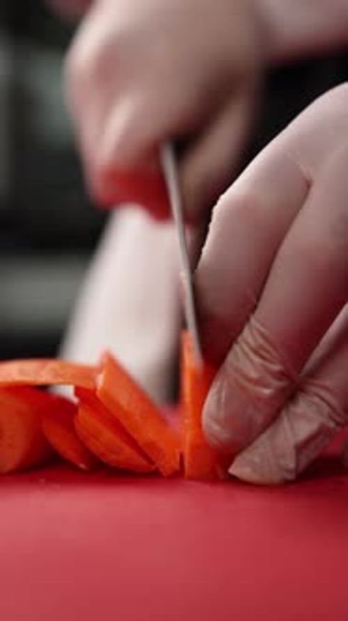 Chopping Carrot on Cutting Board