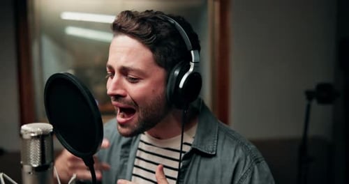 Recording, music and man with singing in studio for entertainment, production and song on album