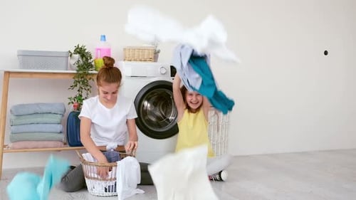 Girls are Playing During Laundry