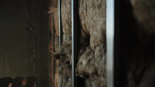 Fiberglass Insulation Between Metal Studs Close Up