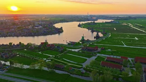 Aerial View of Windmills at Famous Tourist Site Zaanse Schans in Holland on Sunset Zaandam