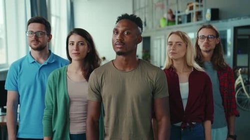 A Diverse Group of Young Professionals in an Office Embodying Teamwork