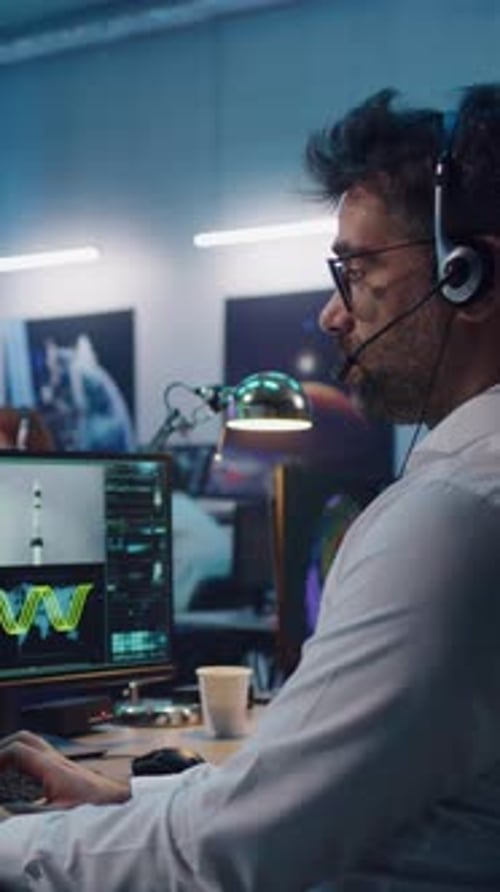 Man Controlling Launch of Rocket