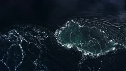 Waves of Water of the River and the Sea Meet Each Other During High Tide and Low Tide