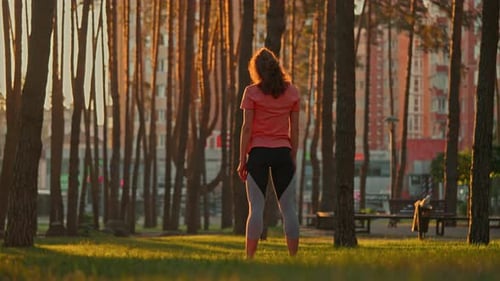 Lady Doing Exercises on the Street