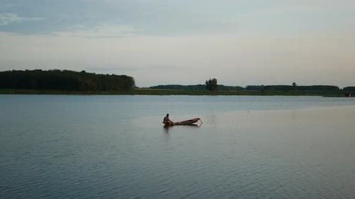 fishermen net fish on traditional wooden boats