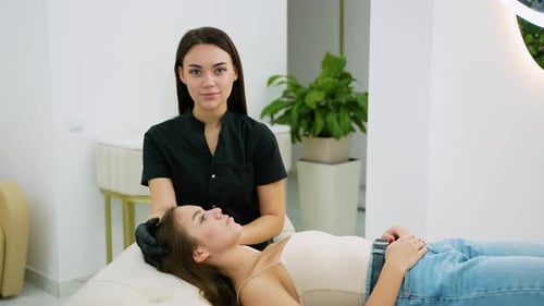 Woman Performs Microblading Procedure on Client