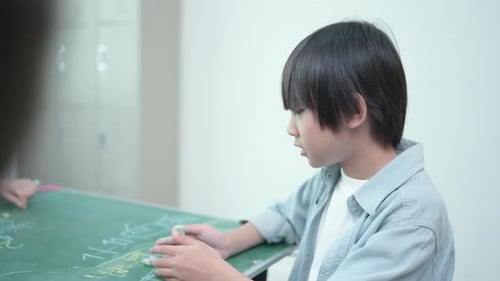 A group of students from an international school With hours of fun learning by drawing picture