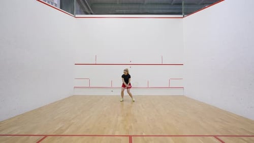 Professional Squash Player Trains Alone on Fourwalled Court
