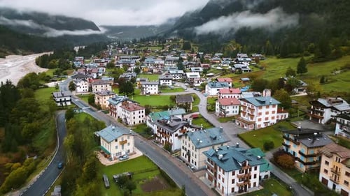Aerial drone view of the village of St. Ulrich in Gröden in the heart of the Dolomites, Italy