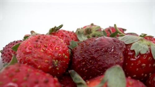 Strawberries close up on white background isolated 4K