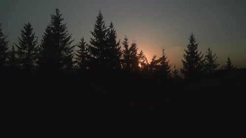 Mountains at Golden Hour Aerial Video Footage of a Vibrant Sunset with Fiery Clouds Stretching Over