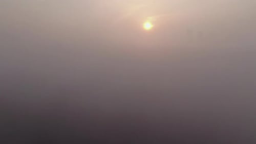 A new town in the haze where the sun rises.