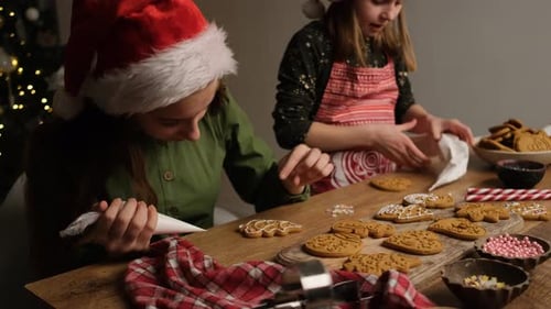 Children Decorating Gingerbread Cookies for Christmas Holiday
