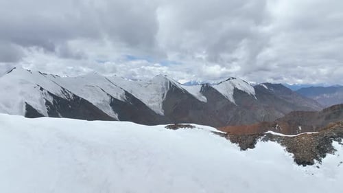 Vast snowfields and glaciers of a high-altitude mountain range
