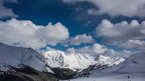 Time Lapse - Beautiful Clouds Moving over Snowcapped Mountains in Loveland Pass Colorado