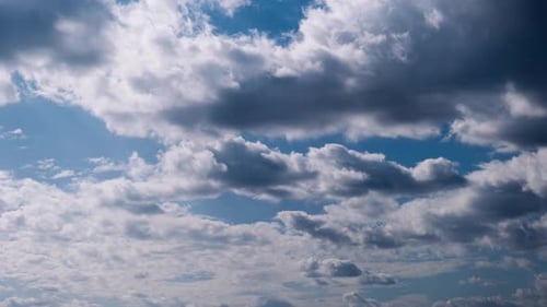 Timelapse of Cumulus Clouds Moves In The Blue Sky