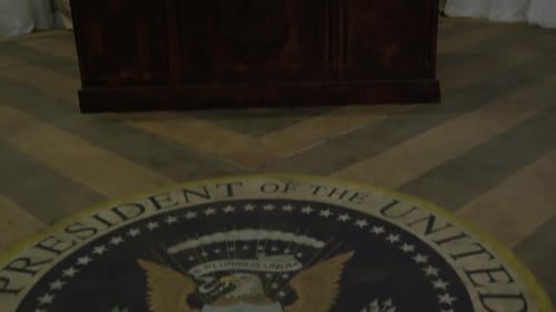 Presidential Figure Talking on the Telephone in Office