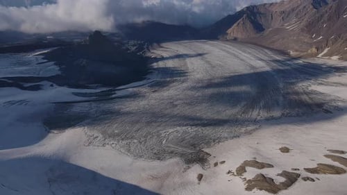 Aerial View Glacier Carves Through Mountains Earth's Masterpiece Glacier in Winter Landscape Haven