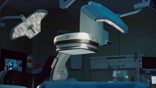 Surgeon Adjusting Medical Lamps in Sterile Operating Room