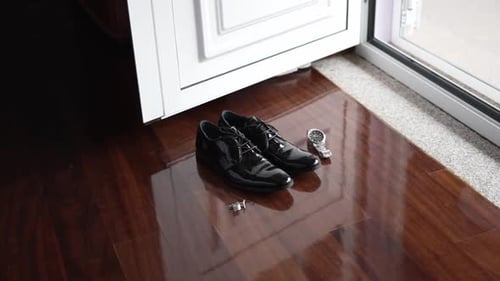Groom's Shoes and Accessories Ready for Wedding