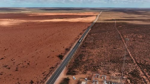 Aerial View Of B Double Tanker Truck Traveling Through Australian Outback.