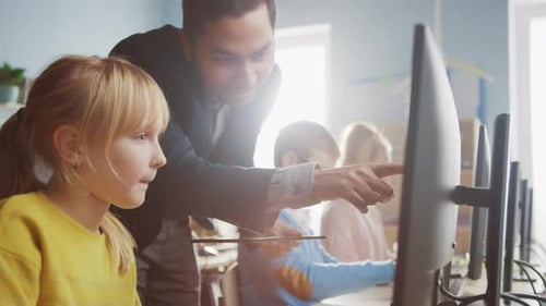 Elementary School Science Classroom: Teacher Explains to a Smart Little Schoolgirl how to use Perso