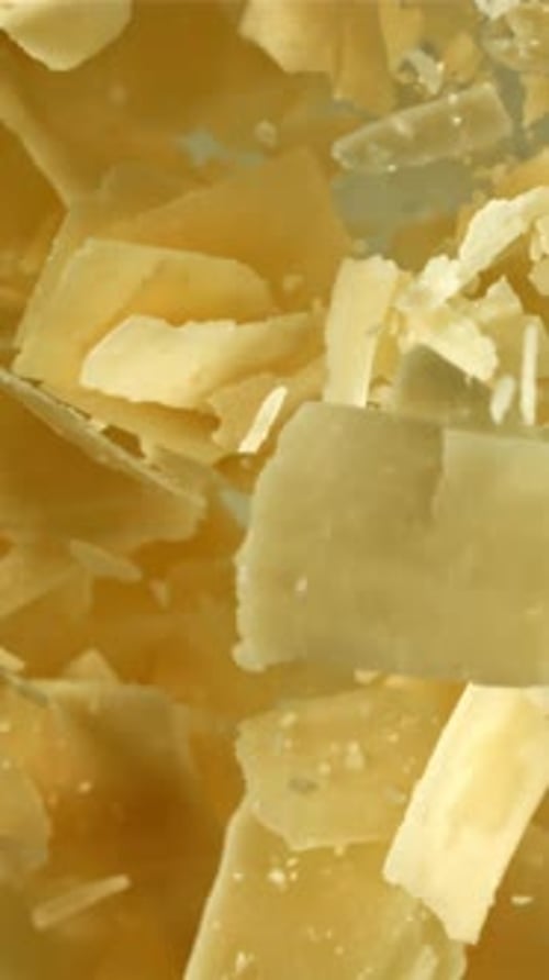 Parmesan Cheese Flies Up and Falls Down Filmed on a Highspeed Camera at 1000 Fps