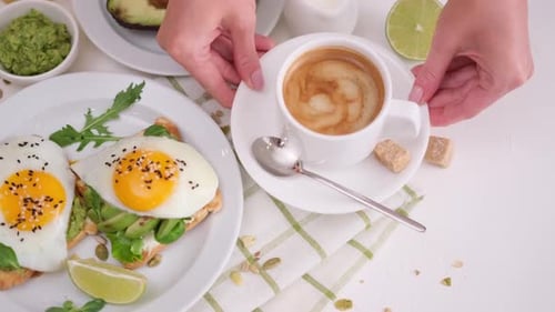Healthy Avocado Toast with Fried Egg and Coffee