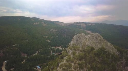 a beautiful sunset over a mountain top and panning trucking shot