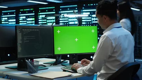 Technician Using Mockup Computer in Data Center