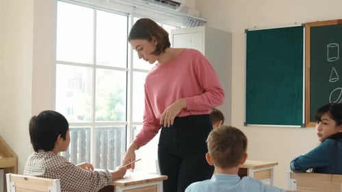 Teacher and Students in Classroom Learning Math